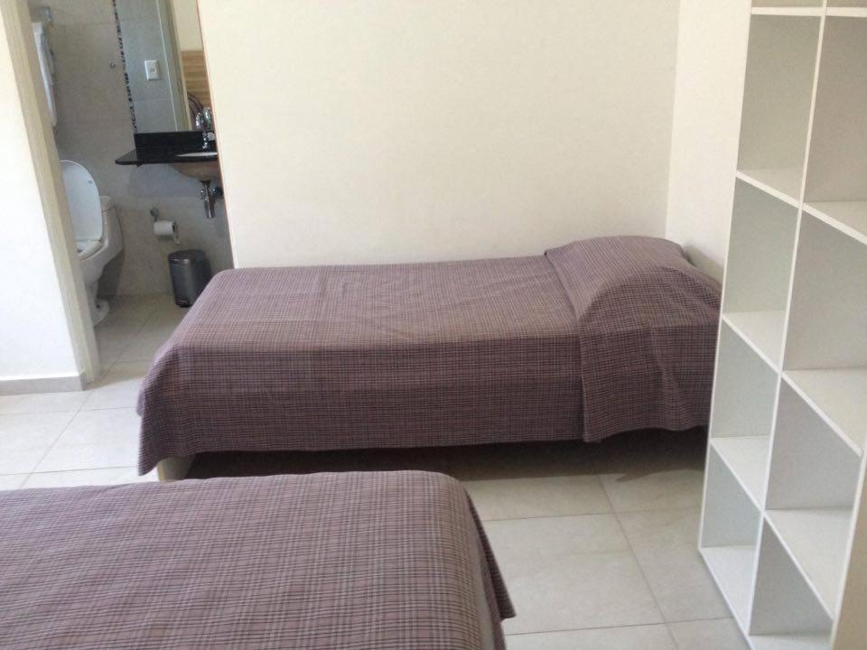 Pousada Parque Suites Estacionamento E Piscina Guarujá Pokoj fotografie